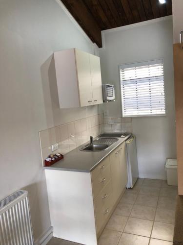 مطبخ, ألبين موتيل أند باكباكرز (Alpine Motel & Backpackers) in اوهاكوني مطبخ, ألبين موتيل أند باكباكرز (Alpine Motel & Backpackers) in اوهاكوني