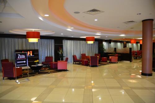 Shared lounge/TV area, Lux Hotel & Spa, Trademark Collection by Wyndham in Arlington Shared lounge/TV area, Lux Hotel & Spa, Trademark Collection by Wyndham in Arlington