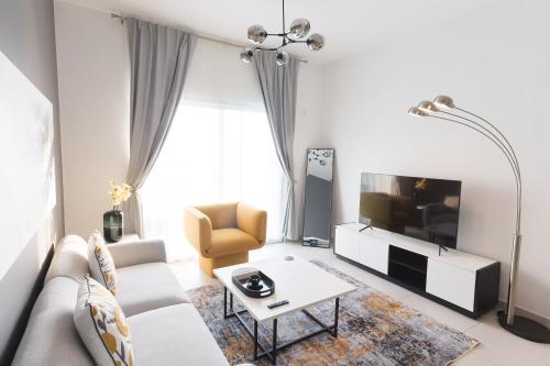 Shared lounge/TV area, CozyCorner - Gym & Pool Access - Reem Island in Al Reem Island Shared lounge/TV area, CozyCorner - Gym & Pool Access - Reem Island in Al Reem Island