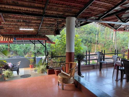 Балкон/терраса, Coorg Ecobreeze Homestay in Кадагадал Балкон/терраса, Coorg Ecobreeze Homestay in Кадагадал
