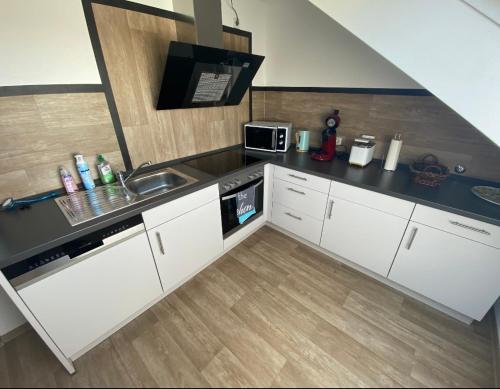 Kitchen, Ferienwohnung Am Rathausberg in Merchweiler Kitchen, Ferienwohnung Am Rathausberg in Merchweiler