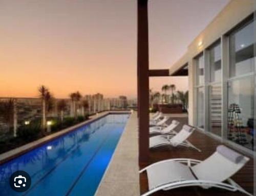 Swimming pool, Studio em Guarulhos, perto do Aeroporto de Gru 15'min in Cumbica Swimming pool, Studio em Guarulhos, perto do Aeroporto de Gru 15'min in Cumbica