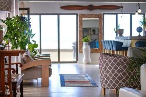 Pub/salon, Chateau de Marine Boutique Hotel & Wellness in Struisbaai Pub/salon, Chateau de Marine Boutique Hotel & Wellness in Struisbaai