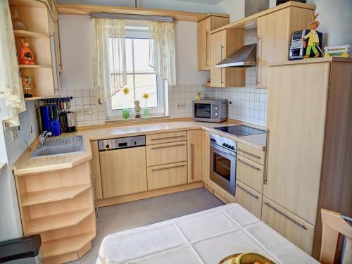 Kitchen, Ferienwohnung Schneider in Ruhstorf Kitchen, Ferienwohnung Schneider in Ruhstorf