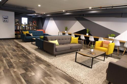 Shared lounge/TV area, Stay Classy in San Diego City Center Shared lounge/TV area, Stay Classy in San Diego City Center