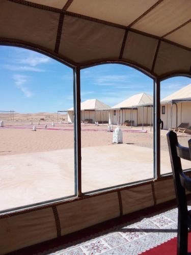 Surrounding environment, SAHARA WAVES CAMP in Merzouga Surrounding environment, SAHARA WAVES CAMP in Merzouga