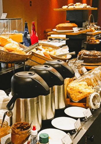 مطعم, O Melhor Apart-Hotel, da Cidade! in سو كيتانو دو سول مطعم, O Melhor Apart-Hotel, da Cidade! in سو كيتانو دو سول