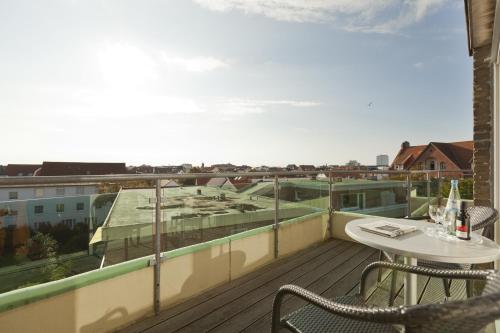 Балкон, Michels Hanseatic Hotel Norderney in Нордерней Балкон, Michels Hanseatic Hotel Norderney in Нордерней
