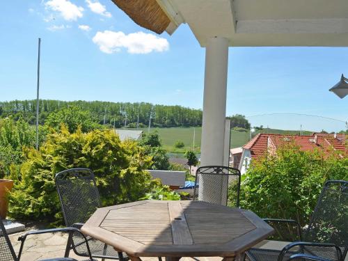 Balcony/terrace, Seedorper Reethus mit Hafenblick, Kamin und Sauna in Ostseebad Sellin Balcony/terrace, Seedorper Reethus mit Hafenblick, Kamin und Sauna in Ostseebad Sellin