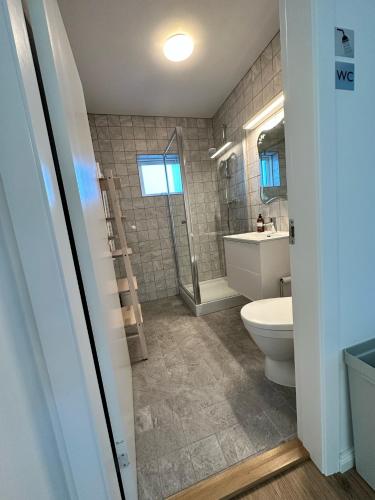 Ванна кімната, Apartment Fernsicht in Боргарнес Ванна кімната, Apartment Fernsicht in Боргарнес