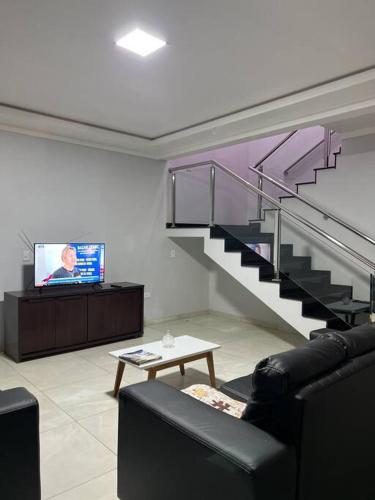 Közös társalgó / TV, Acomodação Três Fronteiras Foz (Acomodacao Tres Fronteiras Foz) in Parque Imperatriz Közös társalgó / TV, Acomodação Três Fronteiras Foz (Acomodacao Tres Fronteiras Foz) in Parque Imperatriz