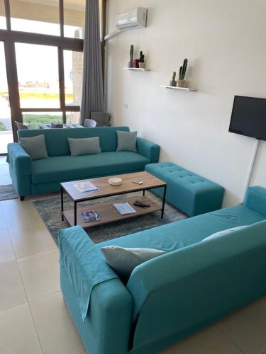 Shared lounge/TV area, Golden Stone Beach in Halat Shared lounge/TV area, Golden Stone Beach in Halat