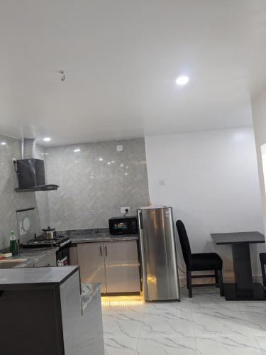 кухня, Easyinn Shortlet Apartment in порт Харкорт кухня, Easyinn Shortlet Apartment in порт Харкорт