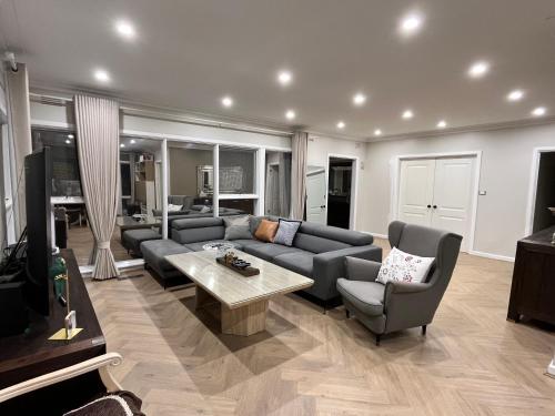 Shared lounge/TV area, Melbourne Balwyn north three bedroom house in Balwyn North Shared lounge/TV area, Melbourne Balwyn north three bedroom house in Balwyn North