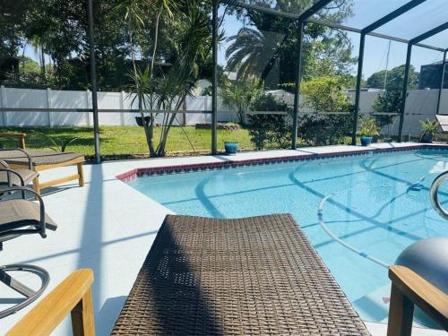 Spacious 4 Bedroom with Arcade and Heated Pool by Beach in 棕櫚港 (FL) Spacious 4 Bedroom with Arcade and Heated Pool by Beach in 棕櫚港 (FL)