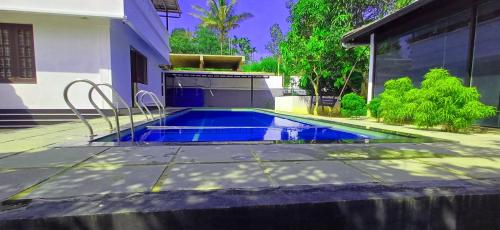 منظر, فيلا 37 متر مربع من 1 غرفة و1 حمام خاص في Muttil (Empire Single Bedroom Villa with Common Pool) in Muttil منظر, فيلا 37 متر مربع من 1 غرفة و1 حمام خاص في Muttil (Empire Single Bedroom Villa with Common Pool) in Muttil