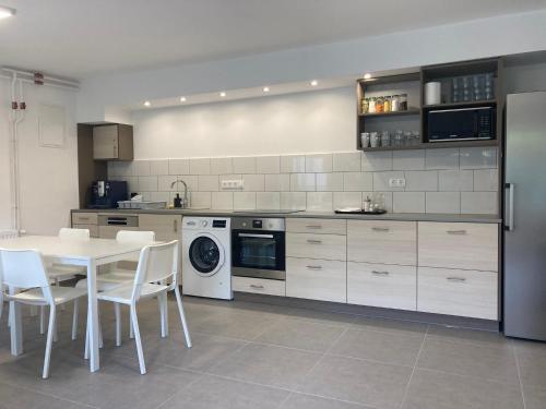 Спільний лаунж/ТБ зона, Szürke Juhar Vendégház (Szurke Juhar Vendeghaz) in Сомбатхей Спільний лаунж/ТБ зона, Szürke Juhar Vendégház (Szurke Juhar Vendeghaz) in Сомбатхей