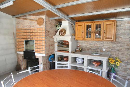 Casa da Pizzaria in คาราปิโต Casa da Pizzaria in คาราปิโต