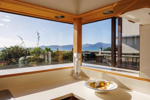 Absolute Beachfront Holiday Home With Private Beach Access To Swim Beach Spectacular Sunsets in Paekakariki Absolute Beachfront Holiday Home With Private Beach Access To Swim Beach Spectacular Sunsets in Paekakariki