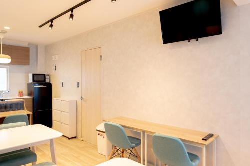 Shared lounge/TV area, Niseko Powder Chalet in Niseko Shared lounge/TV area, Niseko Powder Chalet in Niseko