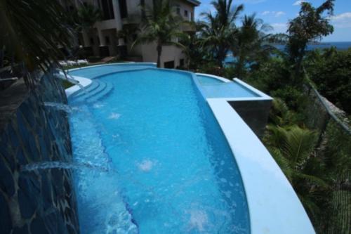 Piscina, Playa Flamingo - 2 BR condo with great ocean views - FLAMINGO TOWERS 25 in Playa Flamingo Piscina, Playa Flamingo - 2 BR condo with great ocean views - FLAMINGO TOWERS 25 in Playa Flamingo