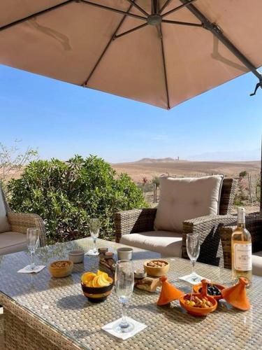 Balcony/terrace, Unique Villa dans le desert d'Agafay avec Petit dejeuner et Diner inclus in Taliouine Balcony/terrace, Unique Villa dans le desert d'Agafay avec Petit dejeuner et Diner inclus in Taliouine