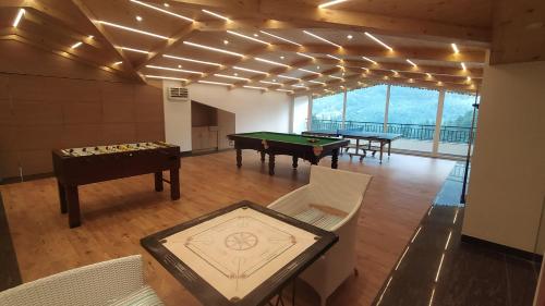 מתקנים לפעילות פנאי, The Orchard Greens Resort - A centrally heated property in מנאלי מתקנים לפעילות פנאי, The Orchard Greens Resort - A centrally heated property in מנאלי