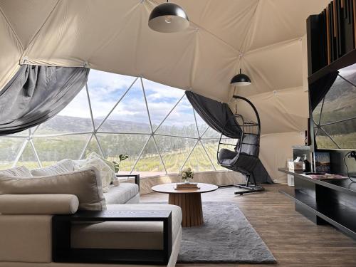 Shared lounge/TV area, Glamping Dome - Pinot in Cromwell Shared lounge/TV area, Glamping Dome - Pinot in Cromwell