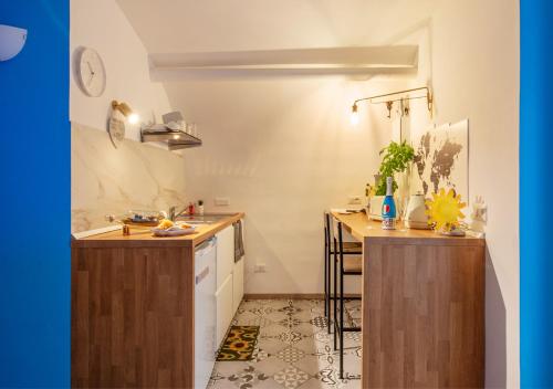 Kitchen, Blue Twins Holiday House in Vittorio Emanuele Kitchen, Blue Twins Holiday House in Vittorio Emanuele