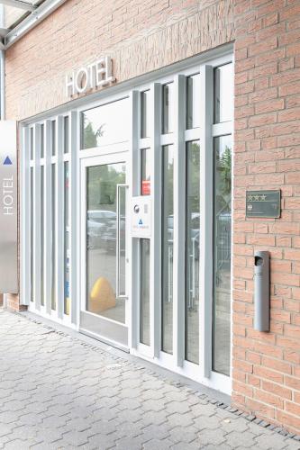 入口, 安姆畢恩特酒店 (Hotel Ambiente) in 希爾特魯普 入口, 安姆畢恩特酒店 (Hotel Ambiente) in 希爾特魯普