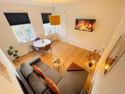 Közös társalgó / TV, aday - Sunset Suite in Randers városközpont Közös társalgó / TV, aday - Sunset Suite in Randers városközpont