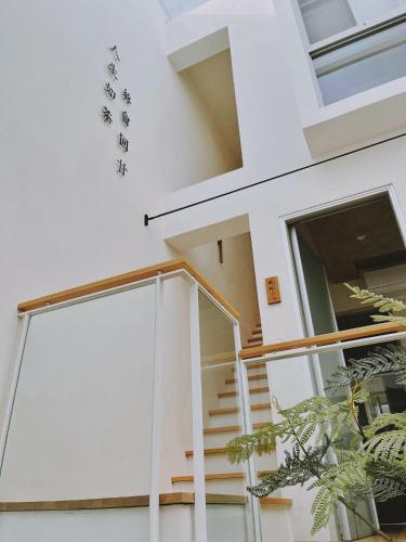 Balcony/terrace, 沐正農場 嘉義包棟民宿 in Chiayi Balcony/terrace, 沐正農場 嘉義包棟民宿 in Chiayi