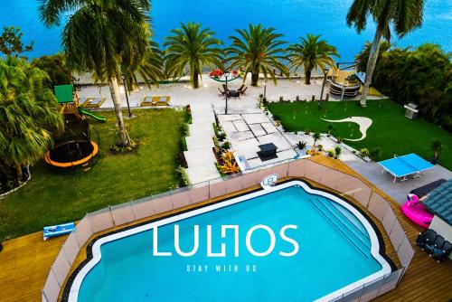 Ultimate Beach Villa Pool, Games & Pedal Boats L12 in Kendale Lakes Ultimate Beach Villa Pool, Games & Pedal Boats L12 in Kendale Lakes