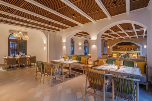 Restaurant, La Festa Phu Quoc, Curio Collection by Hilton in An Thoi Restaurant, La Festa Phu Quoc, Curio Collection by Hilton in An Thoi