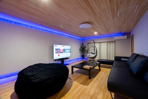 Shared lounge/TV area, Hinoki house in Fukuoka Shared lounge/TV area, Hinoki house in Fukuoka