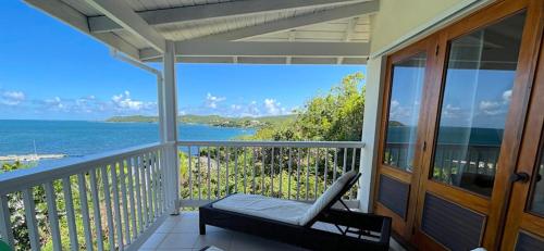 balkong/terrass, Vashays Caribbean Hideaway in Freetown balkong/terrass, Vashays Caribbean Hideaway in Freetown