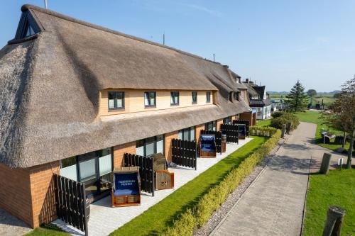 Erkély/terasz, Nordsee-Hotel Arlau-Schleuse in Hattstedtermarsch Erkély/terasz, Nordsee-Hotel Arlau-Schleuse in Hattstedtermarsch