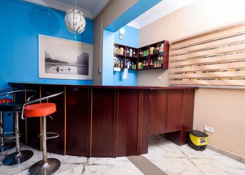 Bar/ Salón, D'Tavern Apartment in Ibadan Bar/ Salón, D'Tavern Apartment in Ibadan