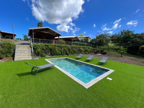 Swimming pool, Bungalow La Lezarde in Lamentin Swimming pool, Bungalow La Lezarde in Lamentin