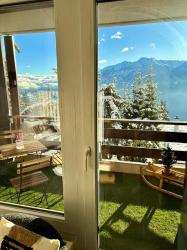 Balkon/teras, Vue imprenable sur les Alpes et Parking privé gratuit (Vue imprenable sur les Alpes et Parking prive gratuit) in Crans Montana Balkon/teras, Vue imprenable sur les Alpes et Parking privé gratuit (Vue imprenable sur les Alpes et Parking prive gratuit) in Crans Montana