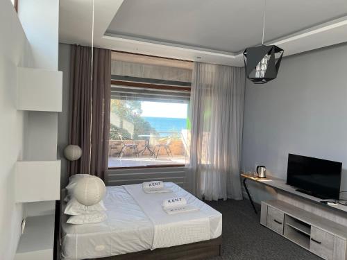 Κρεβάτι, KENT hotel & Restaurant KENT beach in Κομπουλέτι Κρεβάτι, KENT hotel & Restaurant KENT beach in Κομπουλέτι