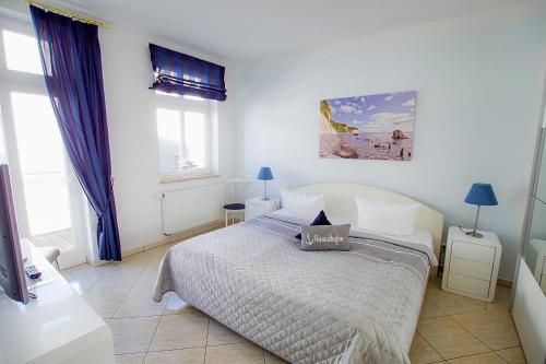 Strandgeflüster App2 - Strandpromenade seitlicher Meerblick, Strandkorb saisonal