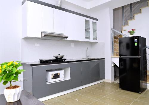 ห้องครัว, บลู โฮม โฮมสเตย์ ฮานอย (Blue Home Homestay Ha Noi) in ฮานอย ห้องครัว, บลู โฮม โฮมสเตย์ ฮานอย (Blue Home Homestay Ha Noi) in ฮานอย