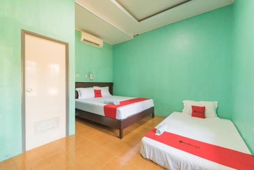 RedDoorz near Pantai Ujung Genteng in ウジュン ゲンテン RedDoorz near Pantai Ujung Genteng in ウジュン ゲンテン