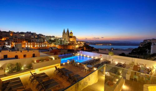 Vista exterior, Pergola Hotel & Spa in Mellieha Vista exterior, Pergola Hotel & Spa in Mellieha