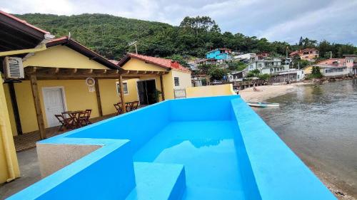 Casa pé na areia com vista especial do pôr do sol. (Casa pe na areia com vista especial do por do sol.) in Ribeirao da Ilha Casa pé na areia com vista especial do pôr do sol. (Casa pe na areia com vista especial do por do sol.) in Ribeirao da Ilha
