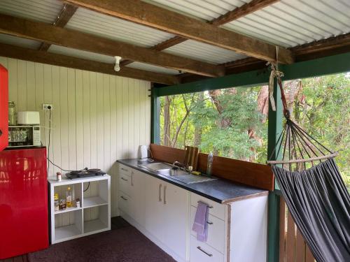 Nimbin waterfall retreat in Німбін Nimbin waterfall retreat in Німбін