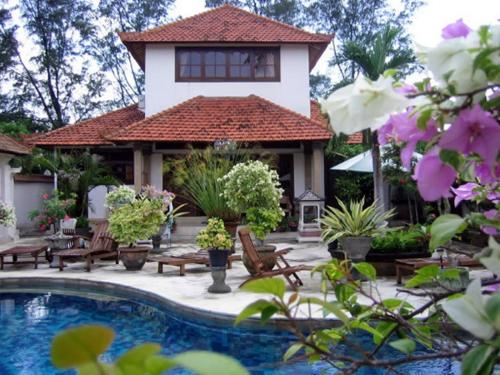 This photo about Ombak Putih Bungalows shared on HyHotel.com