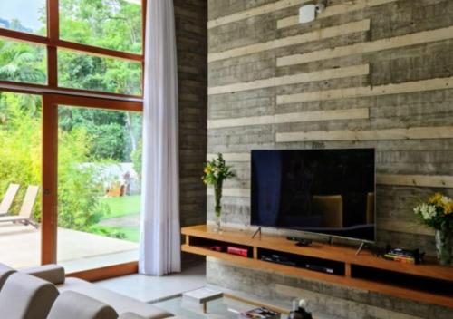 Shared lounge/TV area, Mansao Eco Paradise, Experiencia unica, natureza! in Vargem Grande Shared lounge/TV area, Mansao Eco Paradise, Experiencia unica, natureza! in Vargem Grande
