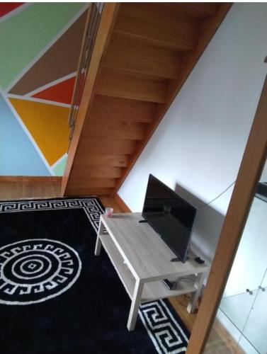jaettu olohuone/TV alue, Maison d'hôte la Courneuve (Maison d'hote la Courneuve) in La Courneuve jaettu olohuone/TV alue, Maison d'hôte la Courneuve (Maison d'hote la Courneuve) in La Courneuve